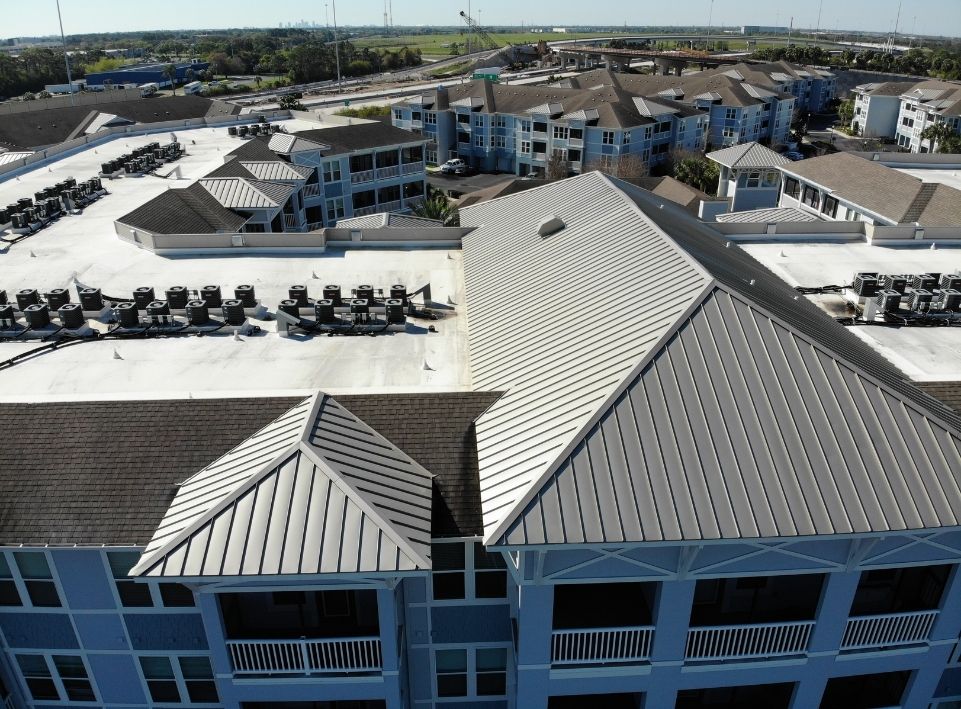 Aerial view of commercial building roofs in Charleston, SC